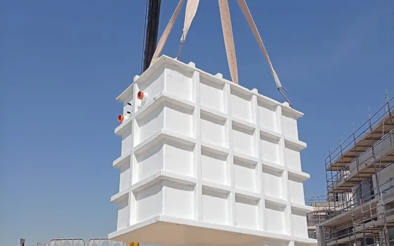 GRP tank being lifted into position