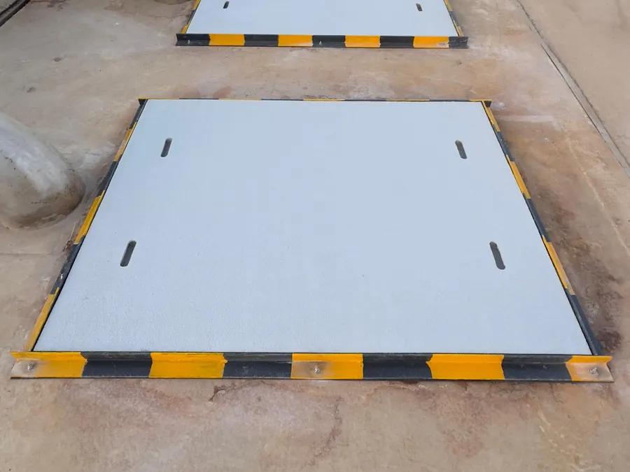 GRP access covers with safety edge marking at a treatment plant