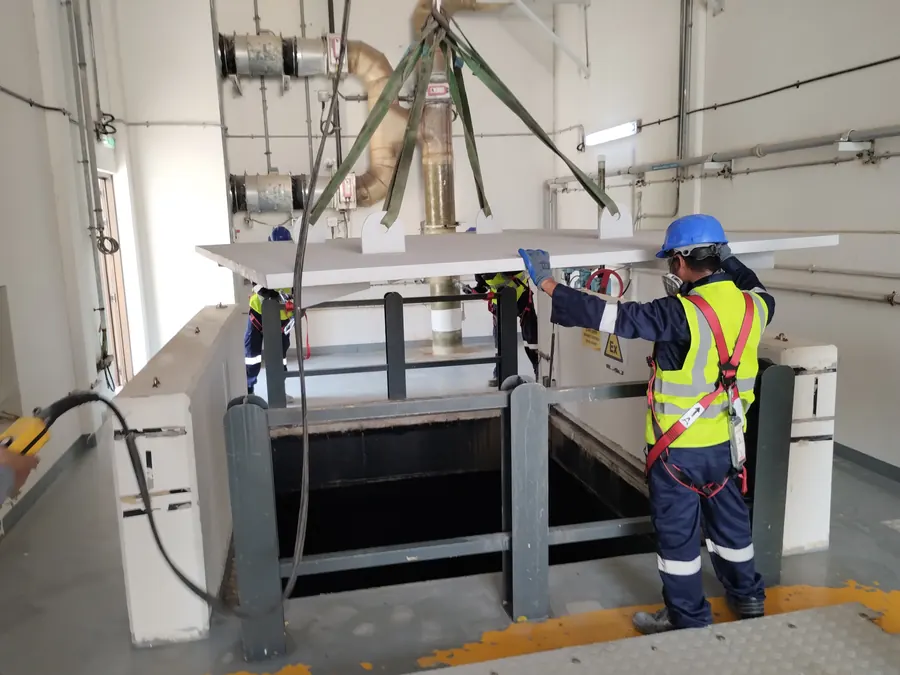 ESA crew installing GRP panels over a plant-room opening