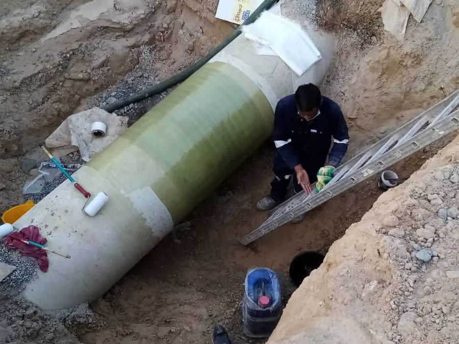 GRP pipe being installed in an excavation
