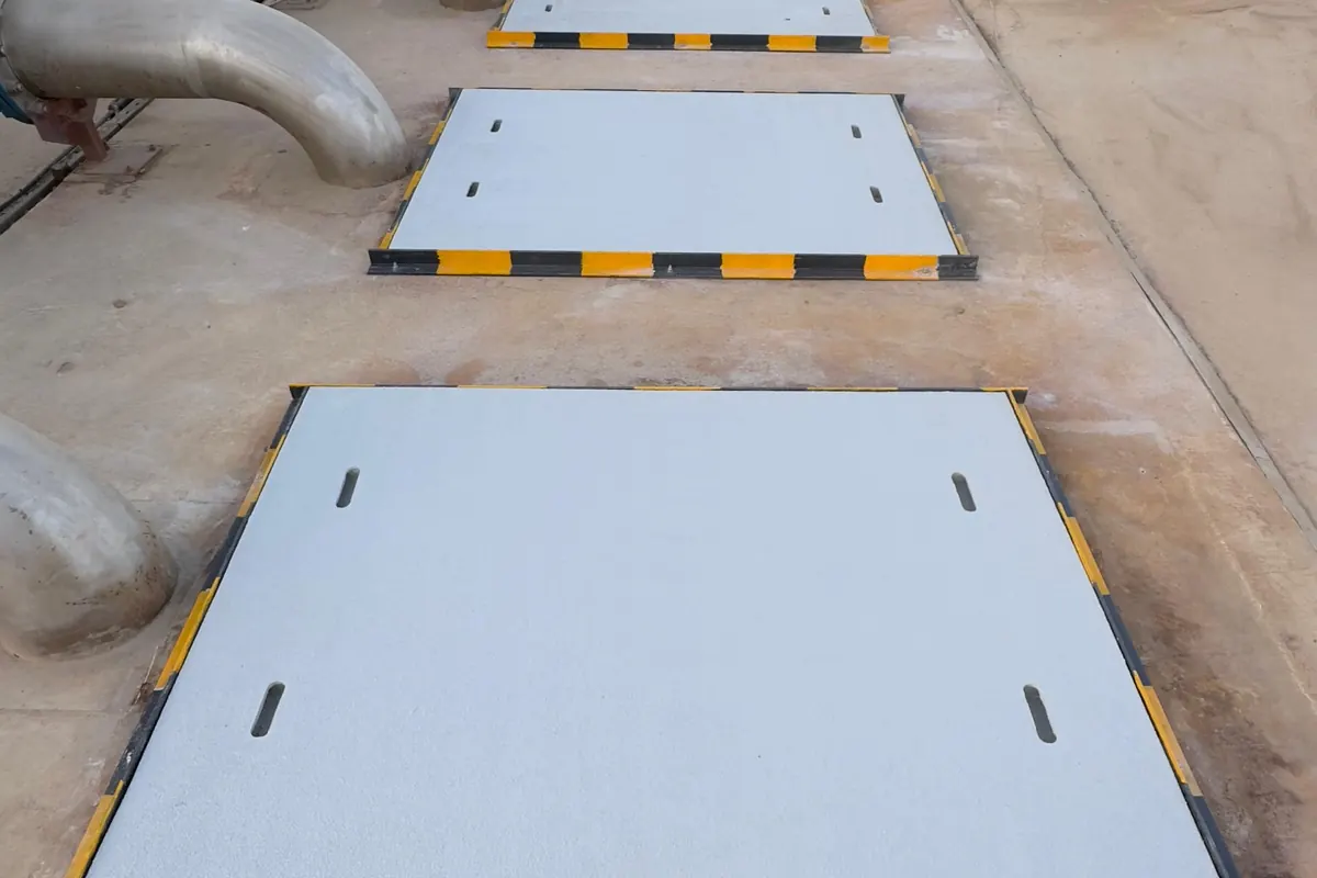 Row of GRP access covers with safety marking